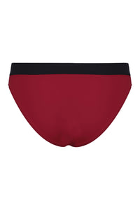A flat lay image showing the back of a pair of Davy J Sustainable Waterwear red low rise bikini briefs with black waistband 