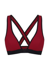 A flat lay image of the front view of a Davy J Sustainable Waterwear red bikini top with crossback design and black front opening clasp