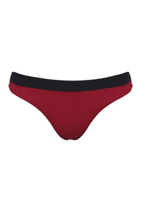 A flat lay image showing the front of a pair of Davy J Sustainable Waterwear red low rise bikini briefs with black waistband 