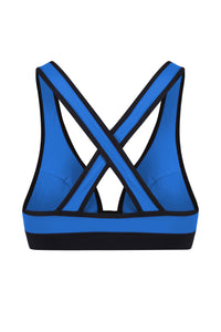A flat lay image of the back view of a Davy J Sustainable Swimwear blue bikini top with black band and bold crossback design