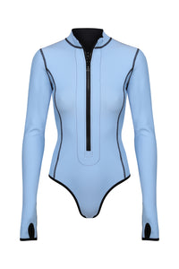 A front view flat lay image of a Davy J Sustainable Waterwear powder blue long sleeve swimsuit with full zip 